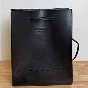 Mondani Black faux Leather Backpack with attached change pouch